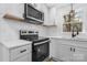 Close up of modern kitchen appliances, backsplash, sink and cabinets at 5520 Chestnut Dr, Hickory, NC 28602