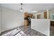 Dining area featuring a chandelier, wooden floors, and a view of the kitchen at 5524 Wyalong Dr, Charlotte, NC 28227