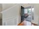 Charming entryway featuring hardwood floors, stylish wainscoting, and an open view to the exterior at 5524 Wyalong Dr, Charlotte, NC 28227