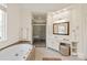 Luxurious bathroom featuring a soaking tub and walk-in shower at 5809 Woodleigh Oaks Dr, Charlotte, NC 28226