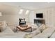 Bonus room featuring skylights, neutral paint, and cozy seating at 5809 Woodleigh Oaks Dr, Charlotte, NC 28226