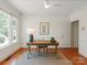 Light-filled office with hardwood floors and ample natural light at 5809 Woodleigh Oaks Dr, Charlotte, NC 28226