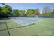 Well-maintained community tennis courts, ideal for recreational games and sports activities at 5809 Woodleigh Oaks Dr, Charlotte, NC 28226