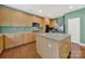 Well-equipped kitchen with granite countertops, stainless steel appliances, and a kitchen island at 656 Hosta Dr, Fort Mill, SC 29715