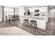 Open concept kitchen with stainless steel appliances, granite countertops, breakfast bar, and adjacent dining area at 1813 Millstream Dr, China Grove, NC 28023