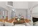 Elegant living room with fireplace, hardwood floors, and neutral decor at 7005 Camrose Crossing Ln, Matthews, NC 28104