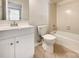 Bathroom with shower, vanity, tile flooring, and a toilet at 7116 Winery Ln, Charlotte, NC 28227