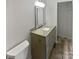 Modern bathroom with granite vanity and walk in closet access at 8026 Regent Park Ln, Charlotte, NC 28210