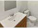 Clean bathroom featuring a modern vanity with white countertop at 8026 Regent Park Ln, Charlotte, NC 28210