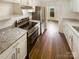 Updated kitchen with granite countertops and stainless steel appliances at 8026 Regent Park Ln, Charlotte, NC 28210