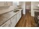 Updated kitchen featuring granite countertops, stainless steel sink and appliances at 8026 Regent Park Ln, Charlotte, NC 28210