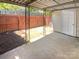 Covered patio area provides a great space for outdoor entertaining at 8026 Regent Park Ln, Charlotte, NC 28210