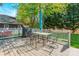 Back deck with outdoor seating and a barbecue grill, perfect for entertaining guests at 8428 Westmoreland Lake Dr, Cornelius, NC 28031