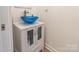 Bathroom featuring modern vanity with a blue glass bowl sink at 8428 Westmoreland Lake Dr, Cornelius, NC 28031