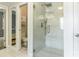 Modern bathroom with a frameless glass shower and sleek, contemporary finishes at 8428 Westmoreland Lake Dr, Cornelius, NC 28031