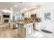Bright kitchen with stainless steel appliances, granite countertops, and island at 8428 Westmoreland Lake Dr, Cornelius, NC 28031