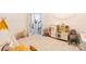Spacious playroom featuring a kitchen set and doorway to adjacent room at 8428 Westmoreland Lake Dr, Cornelius, NC 28031
