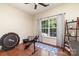 Spare room with large window, exercise equipment, hardwood floors, and natural lighting at 9904 Rocky Ford Club Rd, Charlotte, NC 28269