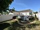 Exterior view of home with above ground pool, fence, and yard at 1009 Preston Dr, Lowell, NC 28098