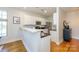 Modern kitchen with white cabinetry, stainless steel appliances, and a breakfast bar, perfect for casual dining at 1101 W 1St St # 405, Charlotte, NC 28202