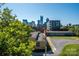 Urban skyline view from above building, showcasing city architecture against a blue sky at 1101 W 1St St # 405, Charlotte, NC 28202