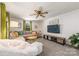 Cozy living room with comfortable seating, modern TV, and a view to the outdoors at 1114 Hartford Ave, Charlotte, NC 28209