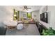 Comfortable living room with sectional sofa, accent chair, and stylish decor creating an inviting atmosphere at 1114 Hartford Ave, Charlotte, NC 28209
