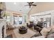 A beautiful open-concept living room flows into the kitchen with hardwood floors and lots of seating at 115 Ladybug Ct, Statesville, NC 28625