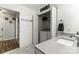 Well-lit laundry room features a modern vanity with grey countertops and convenient washer/dryer closet at 119 Sweet Martha Dr, Mooresville, NC 28115