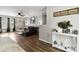 Well-decorated living area with hardwood floors, stylish furnishings, and open space to the kitchen at 119 Sweet Martha Dr, Mooresville, NC 28115
