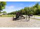 Neighborhood playground with slides, climbing structures, and a safe, wood chip ground cover at 119 Sweet Martha Dr, Mooresville, NC 28115