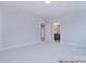 Spacious bedroom boasts neutral carpet and trim, with doorways to other rooms at 122 Huntcliff Dr, Statesville, NC 28677