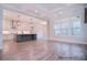 Open-concept living space with a seamless transition to the modern kitchen and bright window views at 122 Huntcliff Dr, Statesville, NC 28677