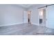 Spacious main bedroom with a view to the Main Bathroom and sliding door closet at 122 Huntcliff Dr, Statesville, NC 28677