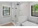 Modern bathroom with glass-enclosed shower, and a large window with a serene view at 127 Holt Ln, Mooresville, NC 28117