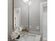 Modern bathroom with stylish mirror, marble countertops, and a sleek design at 127 Holt Ln, Mooresville, NC 28117