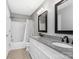 Bathroom with dual sink vanity, granite countertop and modern fixtures at 12954 Sickles Dr, Charlotte, NC 28273