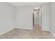 Neutral carpeted bedroom showcasing closet access and neutral paint at 12954 Sickles Dr, Charlotte, NC 28273