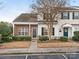 Charming townhome featuring a brick facade and well-maintained landscaping, enhancing its curb appeal at 12954 Sickles Dr, Charlotte, NC 28273
