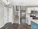 This open kitchen features white cabinets, modern appliances, and a layout perfect for entertaining at 12954 Sickles Dr, Charlotte, NC 28273