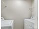Convenient laundry area featuring a washing machine and dryer, ready for use at 12954 Sickles Dr, Charlotte, NC 28273