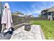 Outdoor patio boasts stylish seating, a fire pit, and a well-maintained fenced yard at 13702 Jacks Ln, Pineville, NC 28134