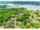 Community aerial showcasing lush greenery, waterfront views, and the street, 15618 Eagleview Dr at 15618 Eagleview Dr, Charlotte, NC 28278