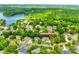 An aerial shows the neighborhood with waterfront in the distance and the location of 15618 Eagleview Dr at 15618 Eagleview Dr, Charlotte, NC 28278