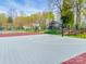 A basketball court offers a great space for recreational games in a landscaped community setting at 15618 Eagleview Dr, Charlotte, NC 28278