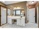 Full bathroom features white cabinets, a shower, and decorative tiled flooring at 15618 Eagleview Dr, Charlotte, NC 28278