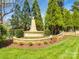 The landscaped 'River Pointe' welcome sign adds a touch of elegance to the community entrance at 15618 Eagleview Dr, Charlotte, NC 28278