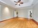 Large primary bedroom features tray ceilings and hardwood floors at 15618 Eagleview Dr, Charlotte, NC 28278