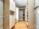 Large walk-in closet features custom storage solutions at 15618 Eagleview Dr, Charlotte, NC 28278