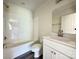 A bathroom features a shower-tub combo, a toilet and a vanity with chrome hardware at 159 Hallman St, Cherryville, NC 28021